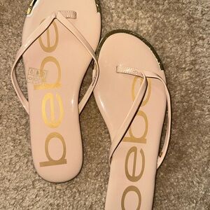 bebe Pale Pink Thong Sandals with Gold Logo Accents